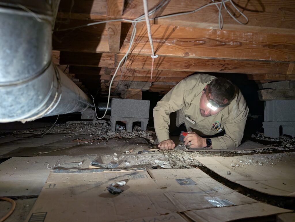 This is how DIFFICULT access and working conditions can be for an HVAC installation. The equipment is down in there too! Not just the ductwork. 